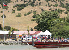 Waka taua tied up at the marae, Okain’s Bay Waitangi Celebrations 2014 (na Neil Challenger)