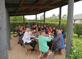 Branch members enjoying wine and food at Greystone Winery