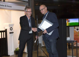 Brad Coombs (on right) after being announced as an NZILA Fellow at the 2018 NZILA Firth conference in Auckland.