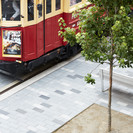 Promenade paving pattern with tram tracks.