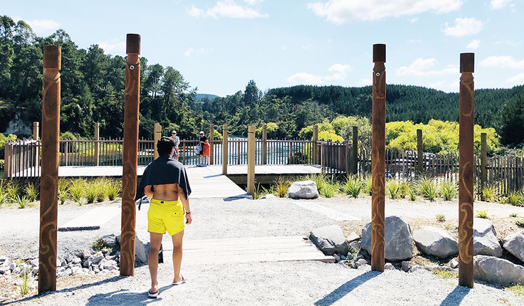 Spa Thermal Park entrance to Ōtumuheke, four entry pou signifying the major stakeholders, and viewing platform beyond.