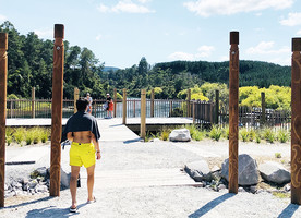 Spa Thermal Park entrance to Ōtumuheke, four entry pou signifying the major stakeholders, and viewing platform beyond.